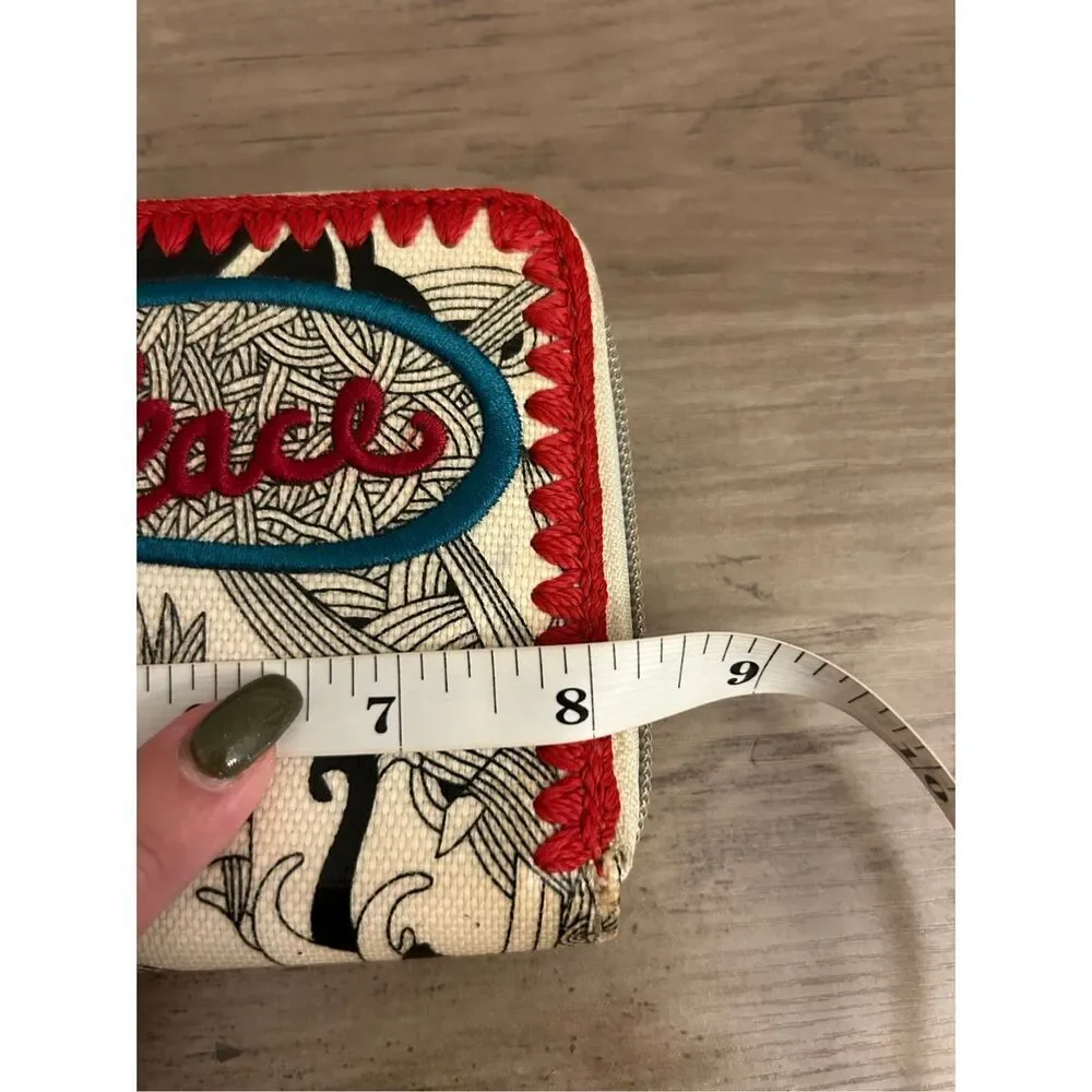 Sakroots Peace embroidered bird & botanical coated canvas zip around wallet